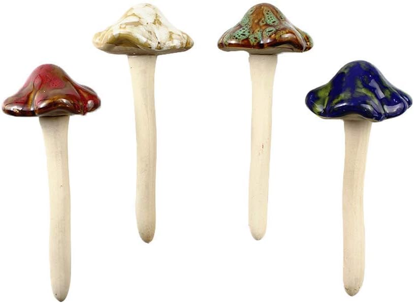 Four vibrant glazed ceramic mushroom garden stakes with natural stems.
