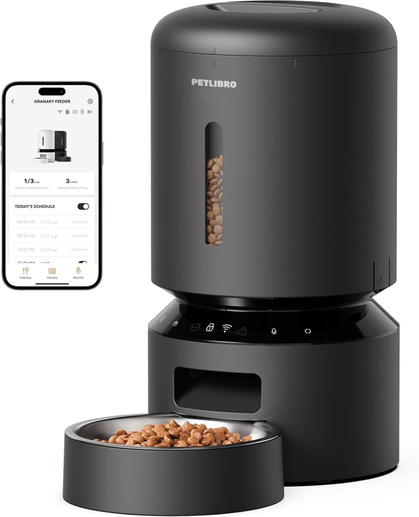 Sleek black automatic pet feeder with clear kibble window, stainless steel bowl, and smartphone app.