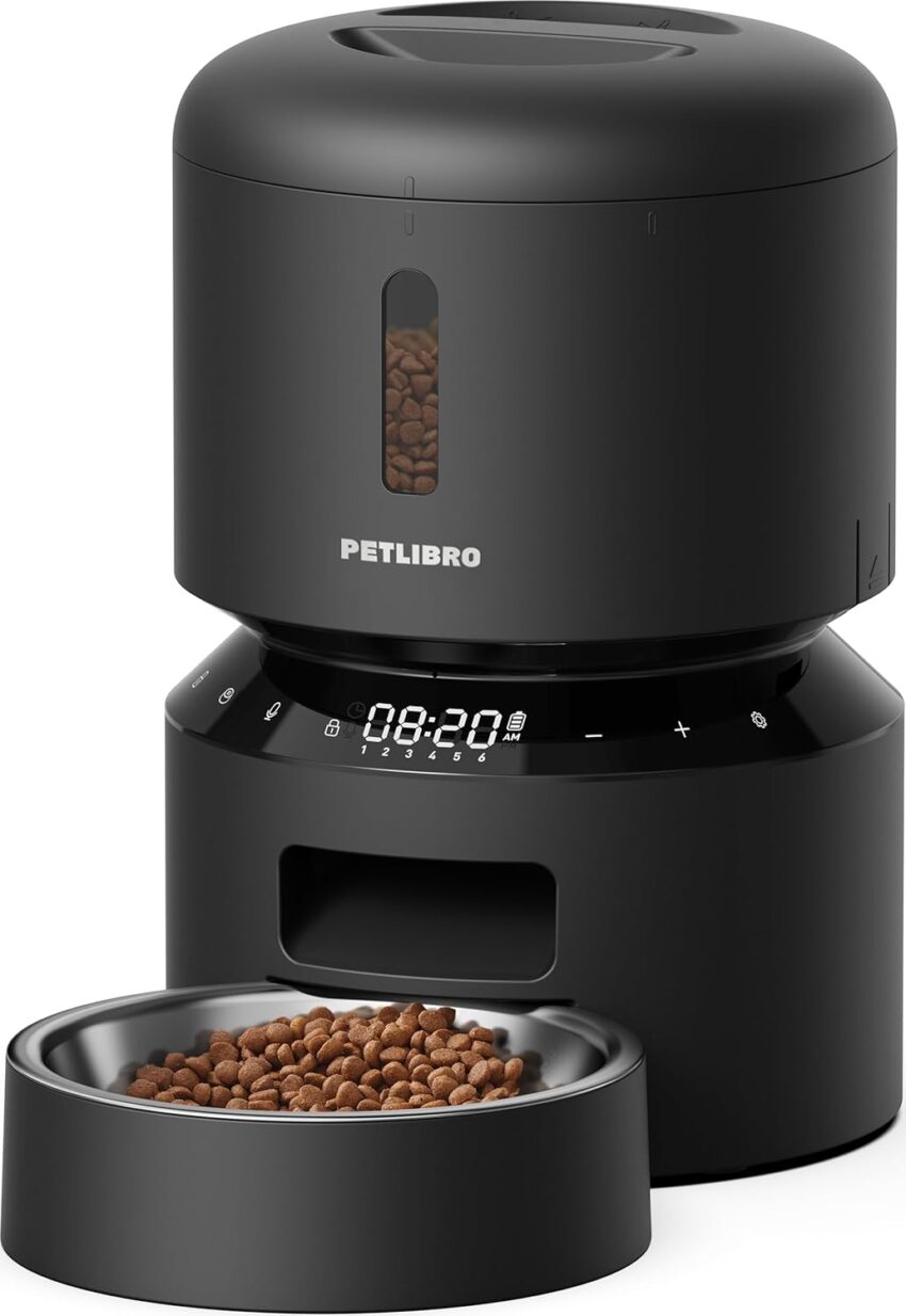 Sleek black automatic pet feeder with digital display, visible kibble, and stainless steel bowl, alongside a compact matching feeder.