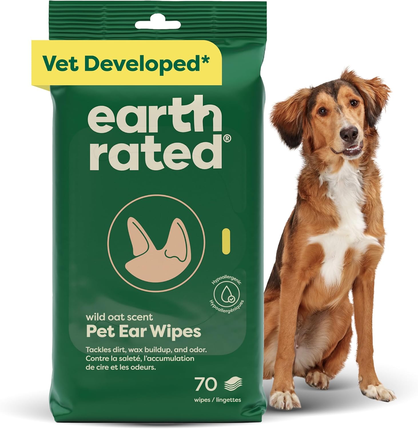 Green pet ear wipe pouch, dog, shampoo bottle, and brush on light gray.